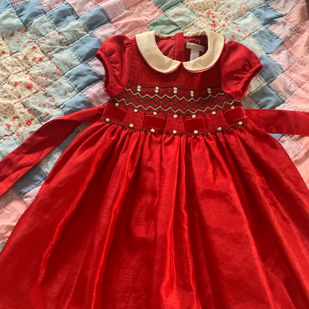 Super nice !  Gently used   Red smocked dress